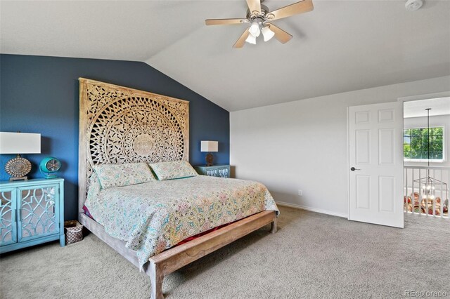 879 Quintana Ln, Erie, CO 80516 - bedroom featuring carpet, vaulted ceiling, baseboards, and a ceiling fan