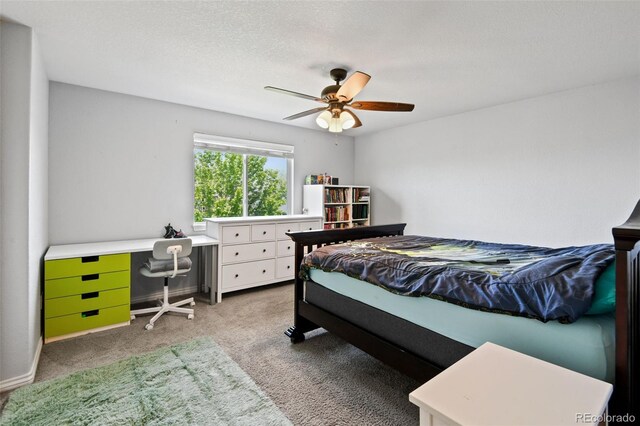 879 Quintana Ln, Erie, CO 80516 - carpeted bedroom with a ceiling fan