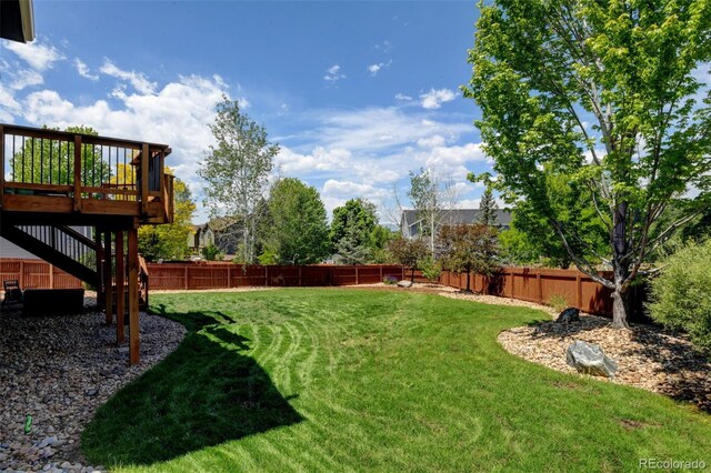 879 Quintana Ln, Erie, CO 80516 - view of yard featuring a deck and stairway