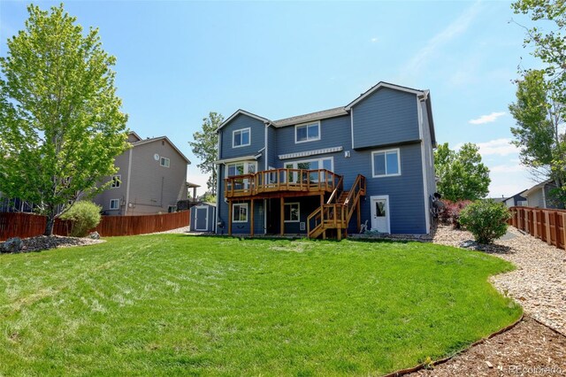 879 Quintana Ln, Erie, CO 80516 - back of house featuring a wooden deck and stairway