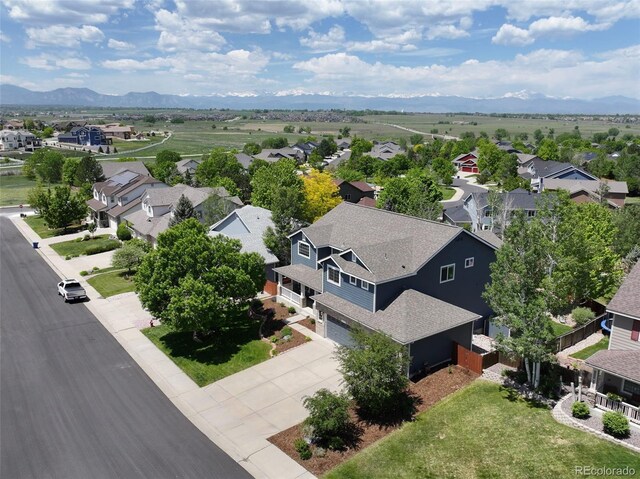 879 Quintana Ln, Erie, CO 80516 - aerial perspective of suburban area featuring mountains