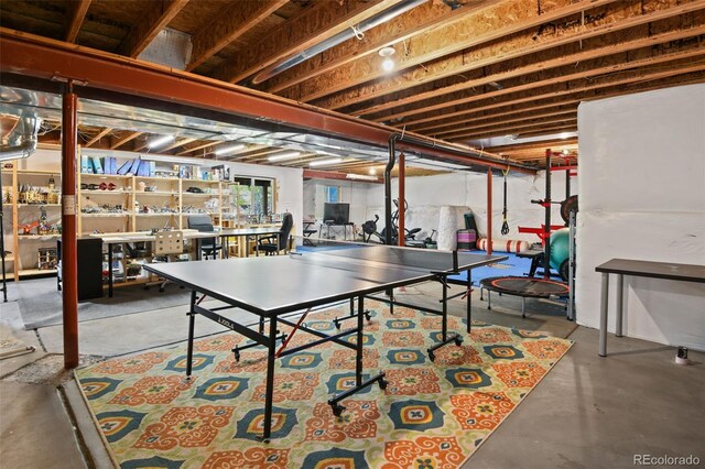 879 Quintana Ln, Erie, CO 80516 - playroom with finished concrete floors