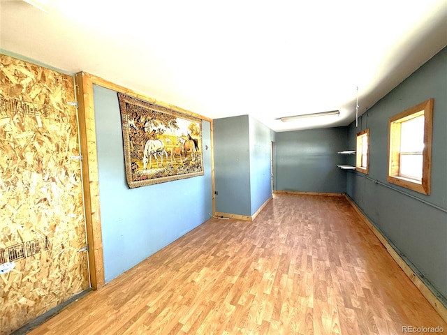 211 Oak St, Salida, CO 81201 - spare room featuring wood finished floors