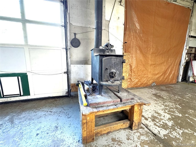 211 Oak St, Salida, CO 81201 - garage featuring a wood stove