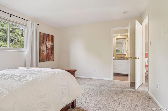 2173 S Ouray St, Aurora, CO 80013 - bedroom with carpet flooring and ensuite bath