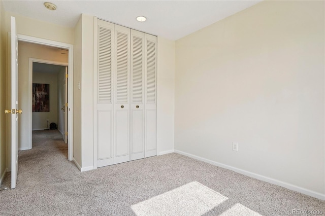 2173 S Ouray St, Aurora, CO 80013 - unfurnished bedroom with carpet and a closet