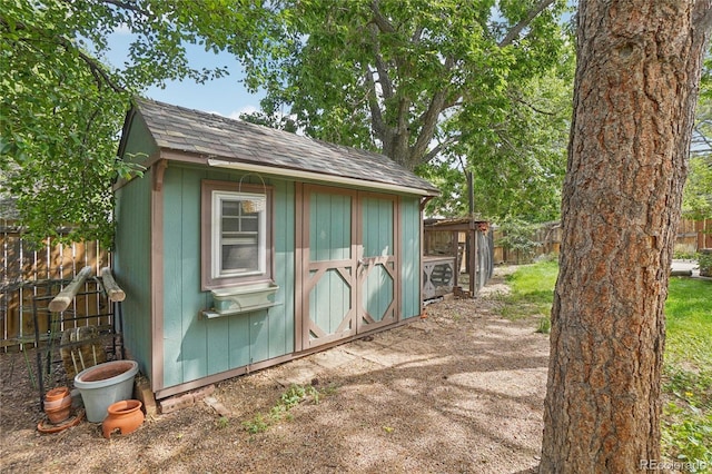 2173 S Ouray St, Aurora, CO 80013 - view of shed with a fenced backyard