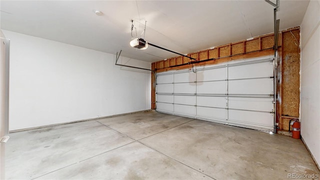 garage featuring a garage door opener
