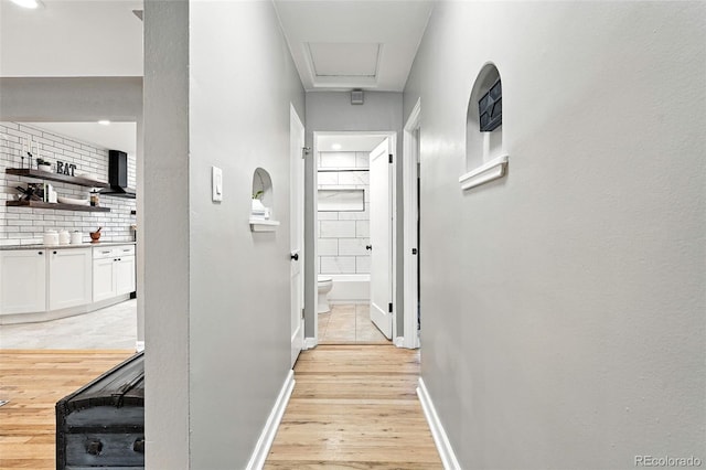 4465 Zephyr St, Wheat Ridge, CO 80033 - hall featuring light wood-style floors and baseboards