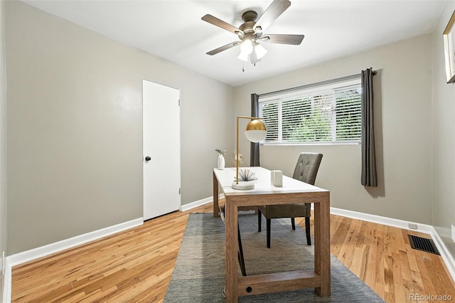 4465 Zephyr St, Wheat Ridge, CO 80033 - office with light wood-style floors and ceiling fan