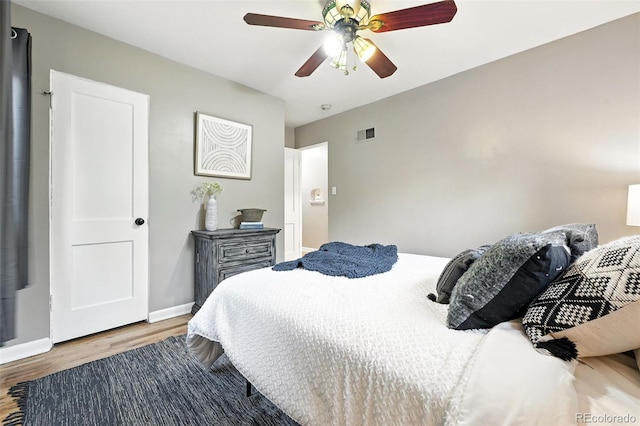 4465 Zephyr St, Wheat Ridge, CO 80033 - bedroom featuring wood finished floors and a ceiling fan