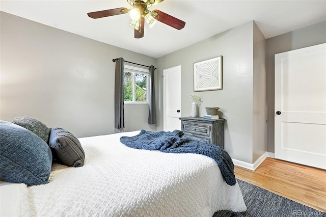 4465 Zephyr St, Wheat Ridge, CO 80033 - bedroom featuring wood finished floors and a ceiling fan