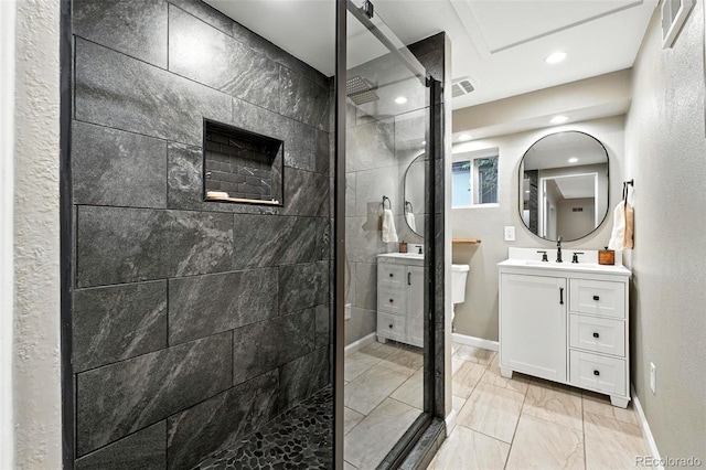 4465 Zephyr St, Wheat Ridge, CO 80033 - full bathroom with marble finish flooring, vanity, a shower stall, and recessed lighting