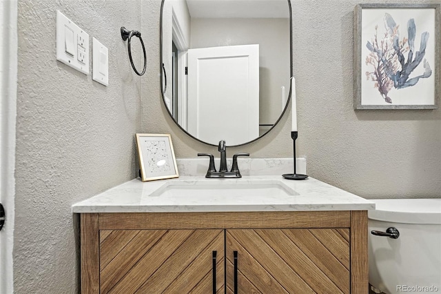 4465 Zephyr St, Wheat Ridge, CO 80033 - bathroom with a textured wall and vanity