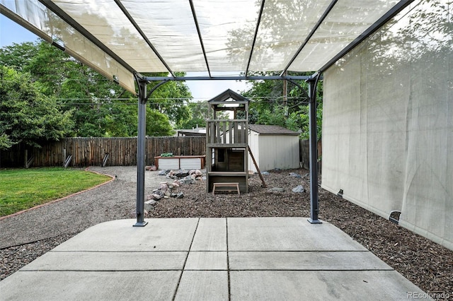 4465 Zephyr St, Wheat Ridge, CO 80033 - fenced backyard with a patio, a storage shed, and a pergola