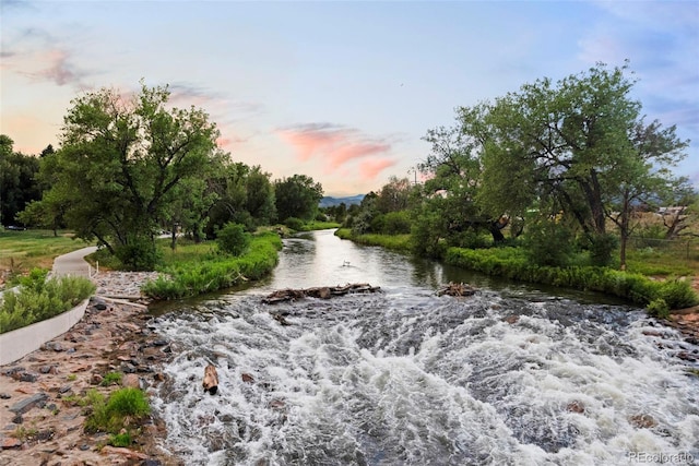 4465 Zephyr St, Wheat Ridge, CO 80033 - view of home's community featuring view of wooded area