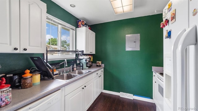 kitchen with white appliances, dark hardwood / wood-style floors, sink, white cabinetry, and electric panel