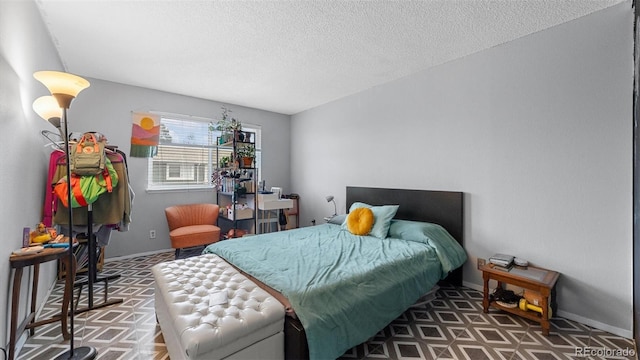 bedroom featuring a textured ceiling