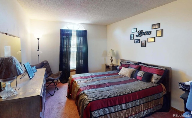 carpeted bedroom featuring a textured ceiling