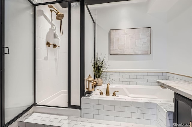 full bathroom with a garden tub and a shower stall