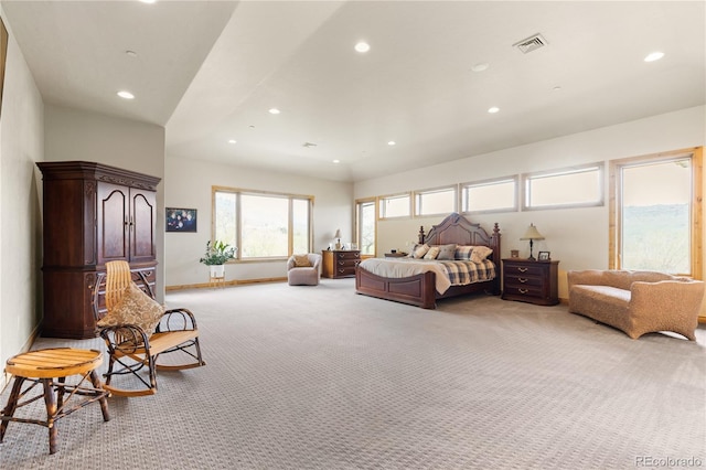 bedroom featuring light carpet