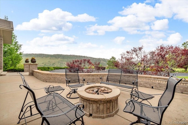 5881 Deer Meadow Trl, Golden, CO 80403 - view of patio featuring a fire pit