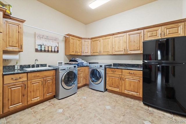 5881 Deer Meadow Trl, Golden, CO 80403 - laundry area with washer and clothes dryer, cabinet space, and light tile patterned floors
