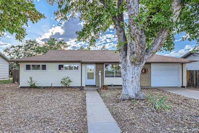 single story home with a garage