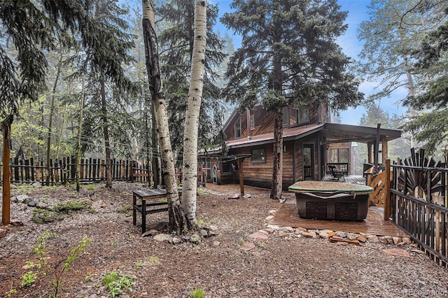 10419 Christopher Dr, Conifer, CO 80433 - fenced backyard with a wooden deck