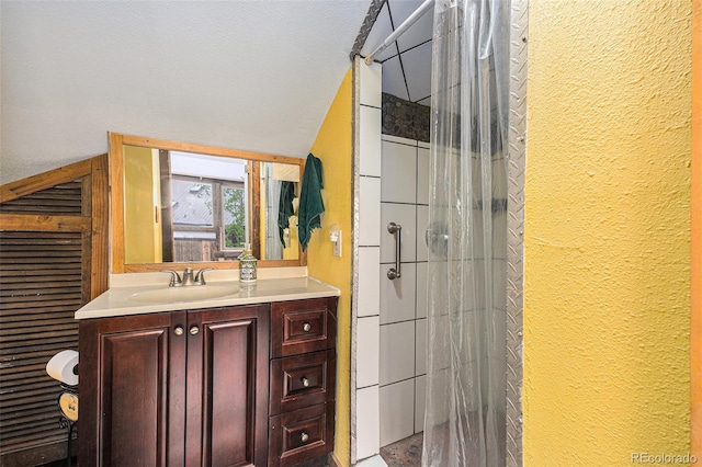 10419 Christopher Dr, Conifer, CO 80433 - full bathroom featuring a textured wall, a shower stall, and vanity