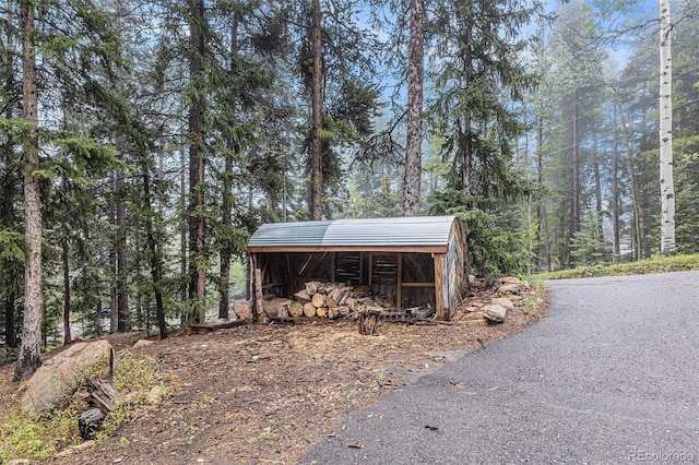 10419 Christopher Dr, Conifer, CO 80433 - view of pole building with a view of trees