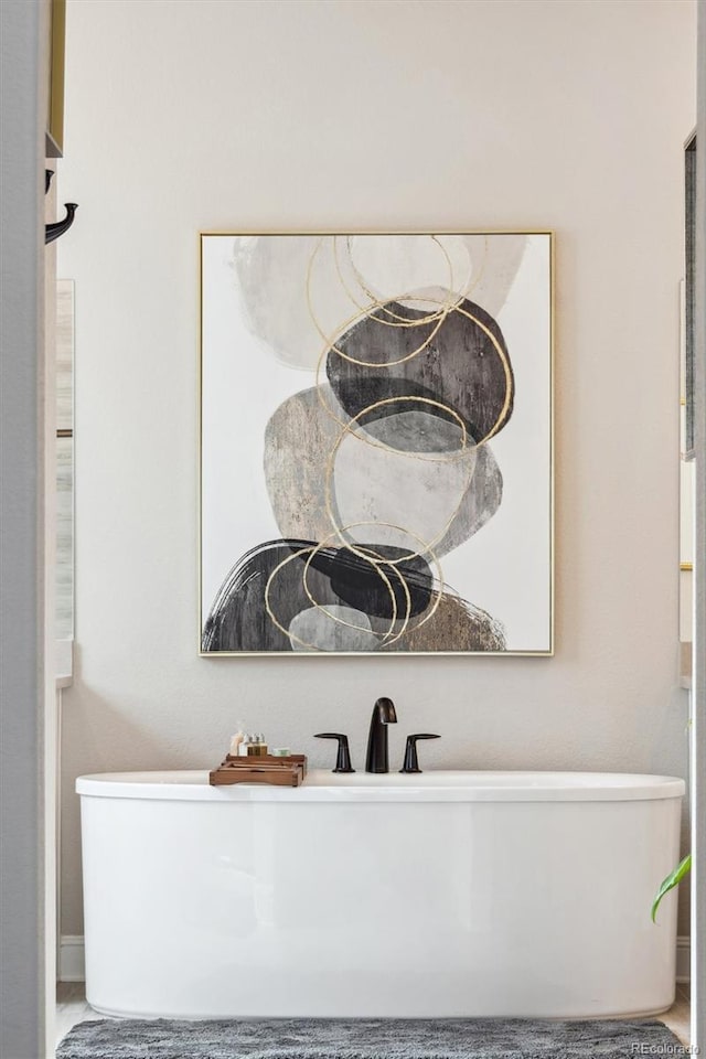 interior details featuring a soaking tub
