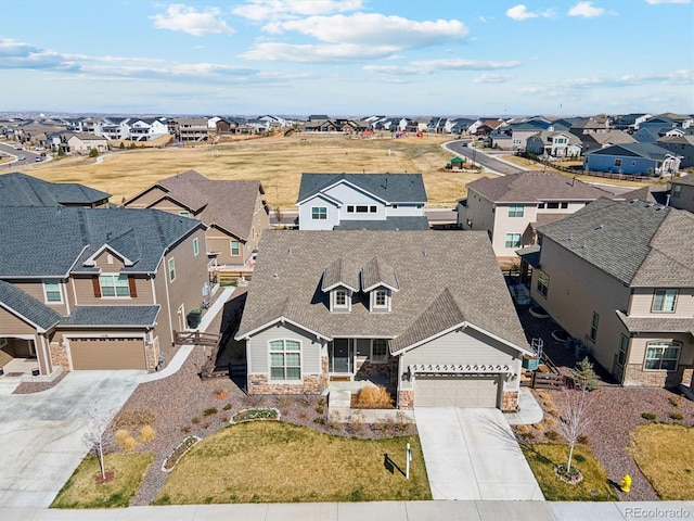 drone / aerial view with a residential view