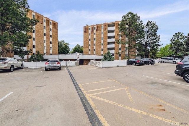 2880 S Locust St Unit 305N, Denver, CO 80222 - view of building exterior with uncovered parking