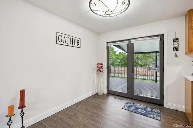 2843 S Otis St, Denver, CO 80227 - doorway to outside featuring dark wood-type flooring and french doors