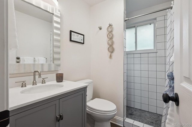 2843 S Otis St, Denver, CO 80227 - bathroom with a tile shower and vanity