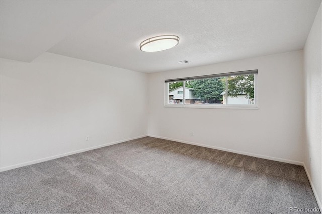2843 S Otis St, Denver, CO 80227 - carpeted spare room with baseboards