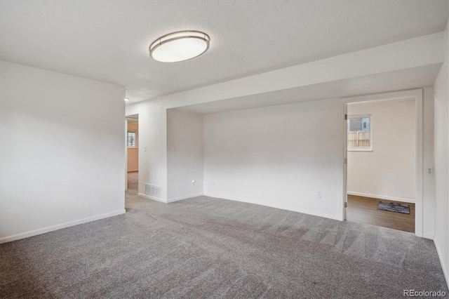 2843 S Otis St, Denver, CO 80227 - empty room featuring carpet flooring and baseboards