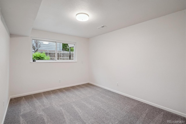 2843 S Otis St, Denver, CO 80227 - empty room featuring baseboards and carpet