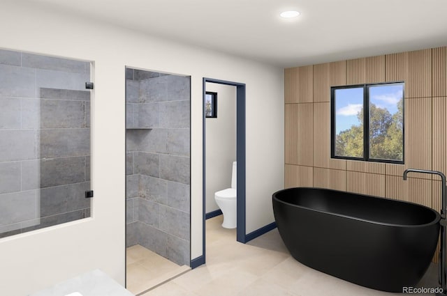full bath with a freestanding tub, toilet, baseboards, recessed lighting, and a walk in shower