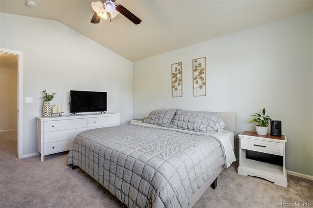 2456 Sierra Springs Dr, Colorado Springs, CO 80916 - bedroom with light colored carpet, lofted ceiling, and a ceiling fan
