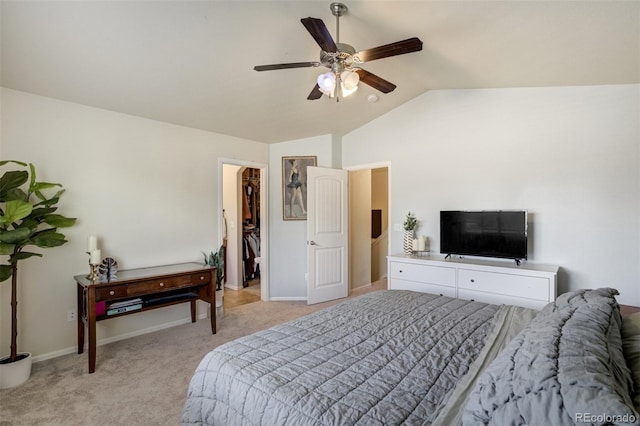 2456 Sierra Springs Dr, Colorado Springs, CO 80916 - bedroom with light colored carpet, vaulted ceiling, a spacious closet, and ceiling fan