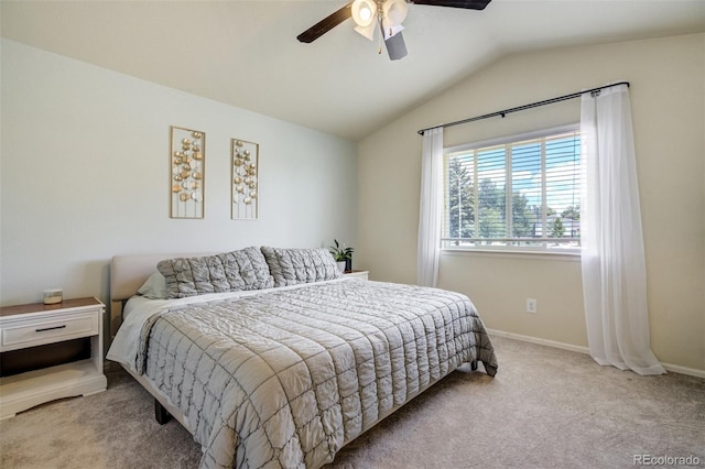 2456 Sierra Springs Dr, Colorado Springs, CO 80916 - carpeted bedroom with vaulted ceiling and ceiling fan