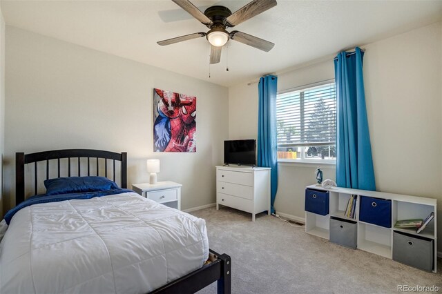 2456 Sierra Springs Dr, Colorado Springs, CO 80916 - carpeted bedroom with baseboards and ceiling fan