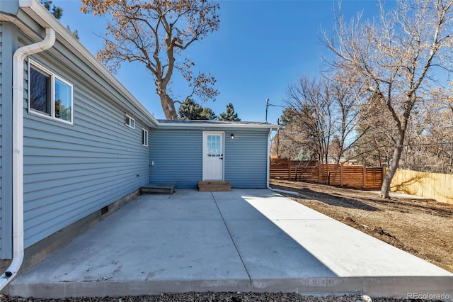 view of patio / terrace with entry steps and fence