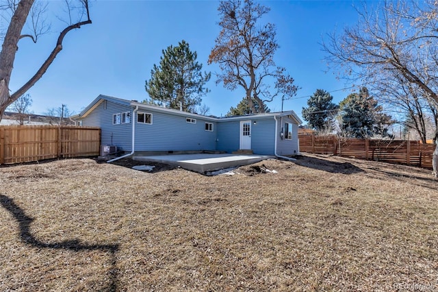 back of property featuring a patio area and fence private yard