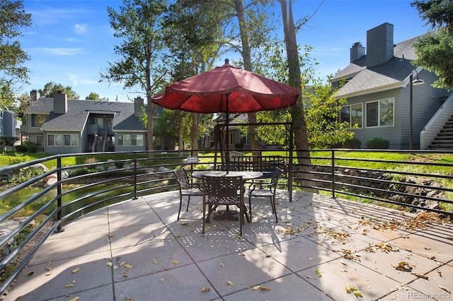 view of patio / terrace featuring a balcony