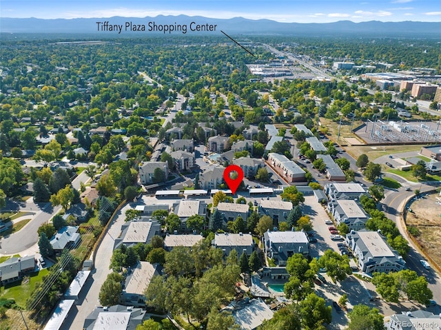 drone / aerial view featuring a mountain view