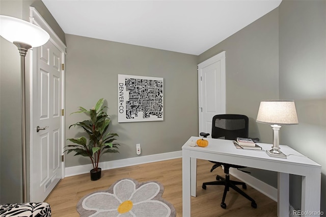 office space with hardwood / wood-style floors