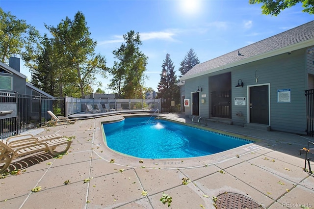 view of swimming pool featuring a patio